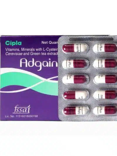 Adgain Plus capsules by Cipla, featuring vitamins, minerals, L-Cysteine, Saccharomyces Cerevisiae, and green tea extract. Capsules in a blister pack with 10 capsules.