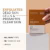 Dermatouch Kojic Acid 1% Syndet Soap being held beside text highlighting exfoliation, dead skin cell removal, and suitability for all skin types.