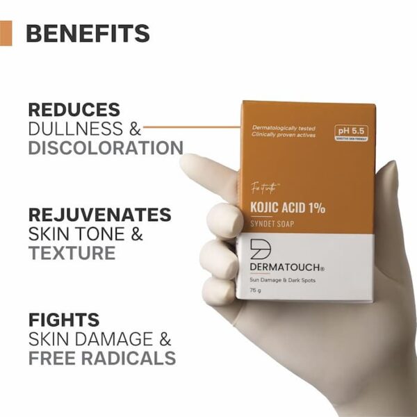 Dermatouch Kojic Acid 1% soap held in hand with benefits including reduced dullness, improved skin tone, and protection against free radicals.