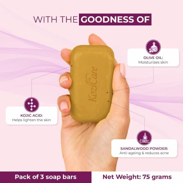 A hand holding Kozicare Sandalwood Soap enriched with kojic acid, olive oil, and sandalwood powder for skin brightening and moisturising.