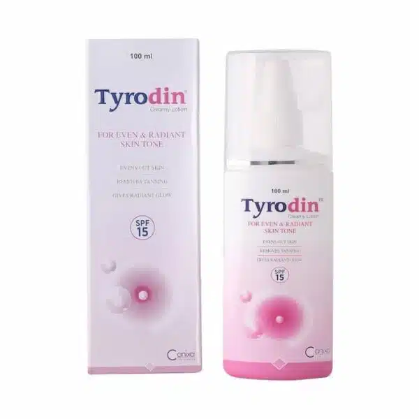 Tyrodin creamy lotion bottle with outer packaging showing SPF 15 and skin tone improvement benefits.
