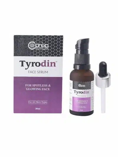 Tyrodin face serum bottle placed next to its outer box and dropper on a white background.