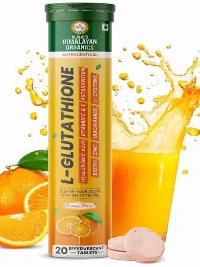 Tube of L-Glutathione effervescent tablets with oranges, orange juice splash, and supplement details like vitamins, zinc, biotin, and hyaluronic acid.