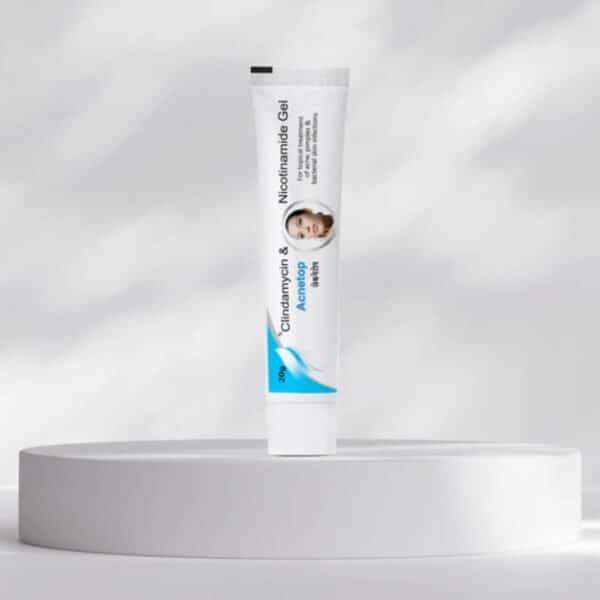 Acnetop acne treatment gel tube placed on a round display platform