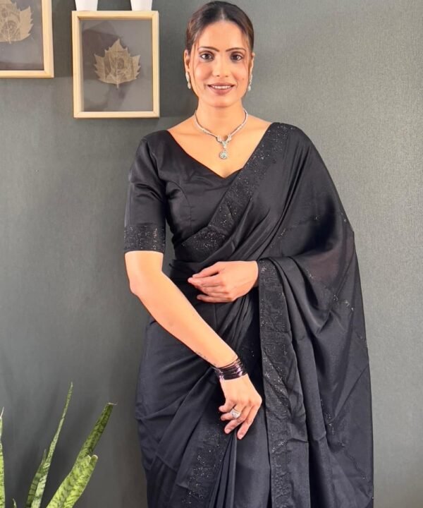 Women wearing ready to wear black georgette silk saree