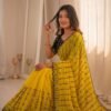 Elegant yellow mirror work saree for festive occasions
