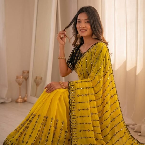 Elegant yellow mirror work saree for festive occasions